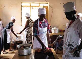 Women preparing food as part of a HOFAD livelihoods training
