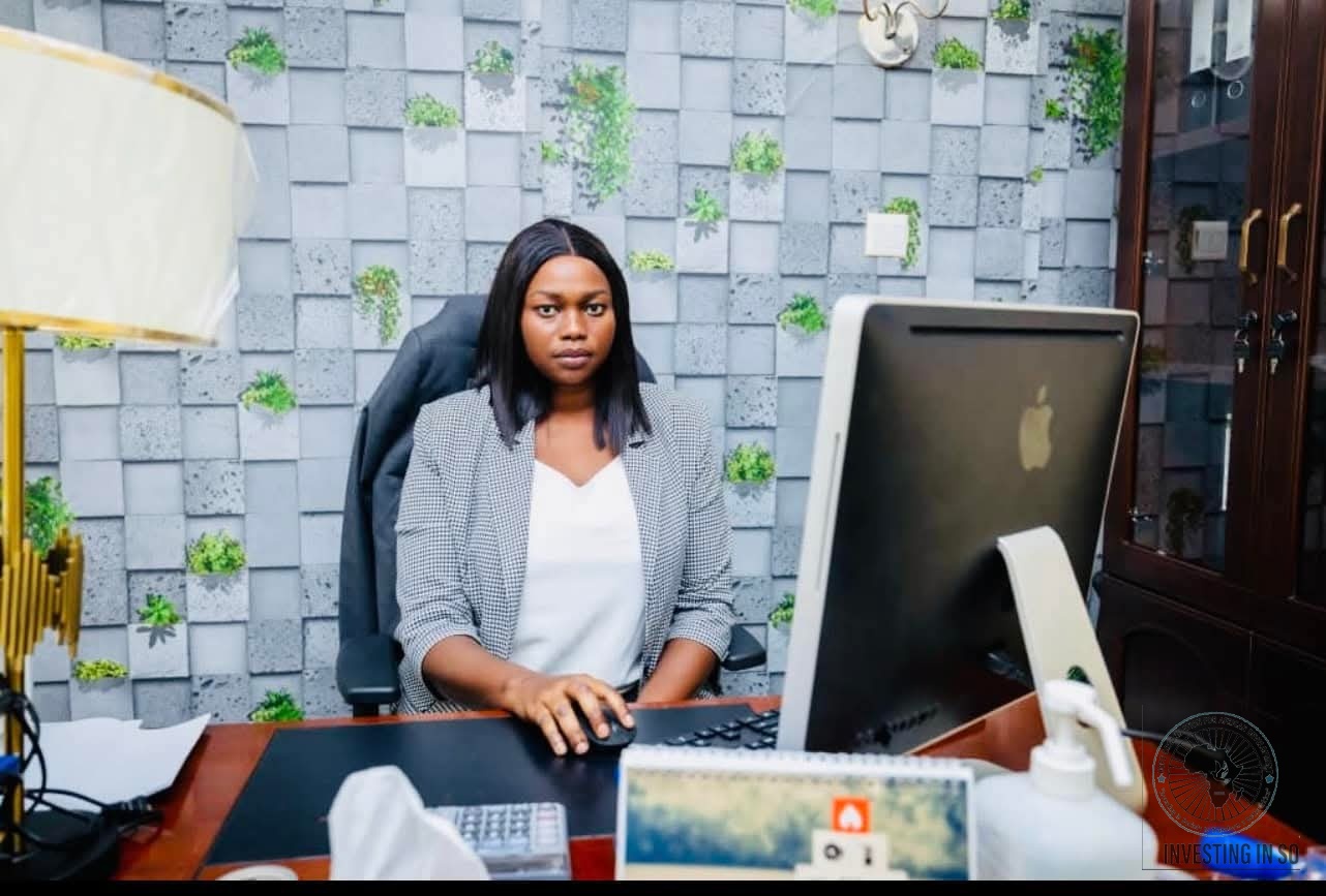 HOFAD staff member at her office desk